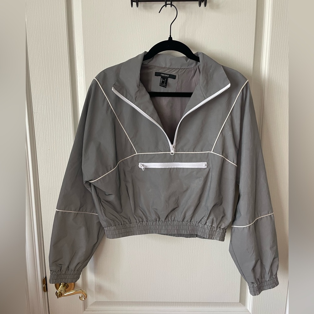 Light reflecting pull over bomber jacket
